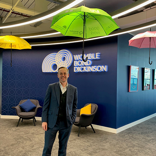 Paul Stewart in WBD's Newcastle office with umbrella display